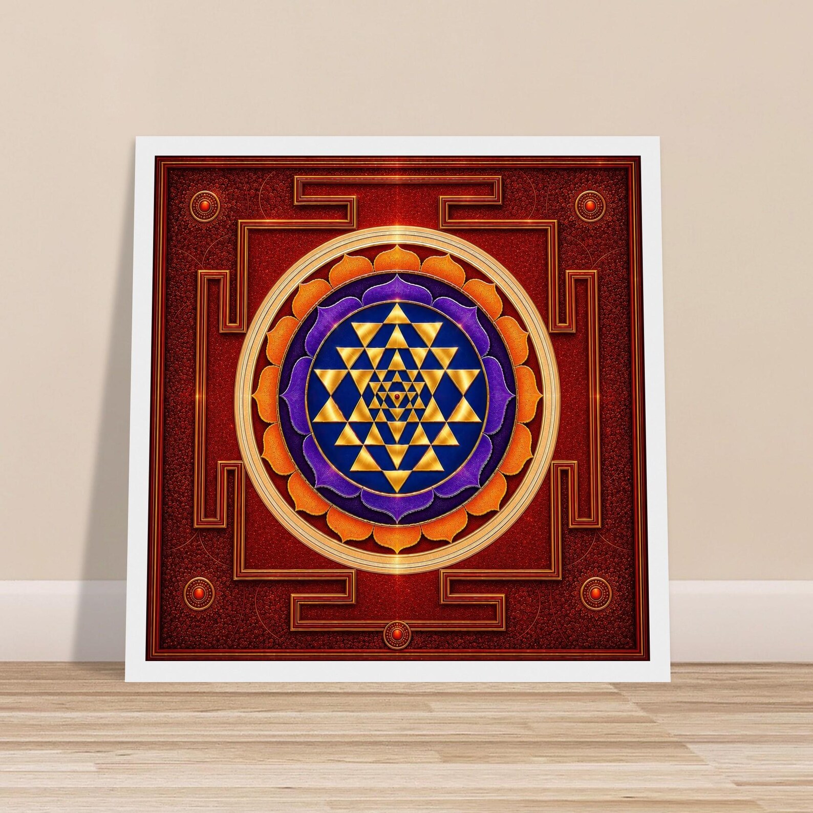 Sri Yantra fine art poster leaning against a wall on a wooden floor